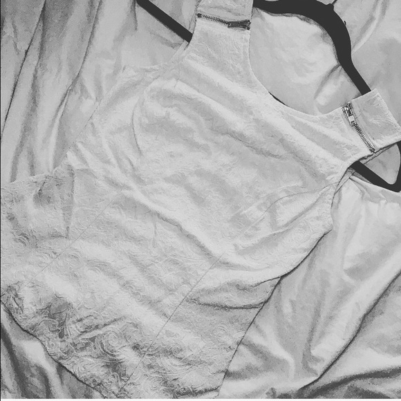 Patterned white top with back opening