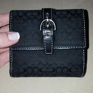 Black Coach wallet with snap closure coin pouch