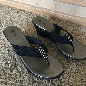 Black wedge sandals.