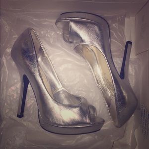 Shiny silver pumps