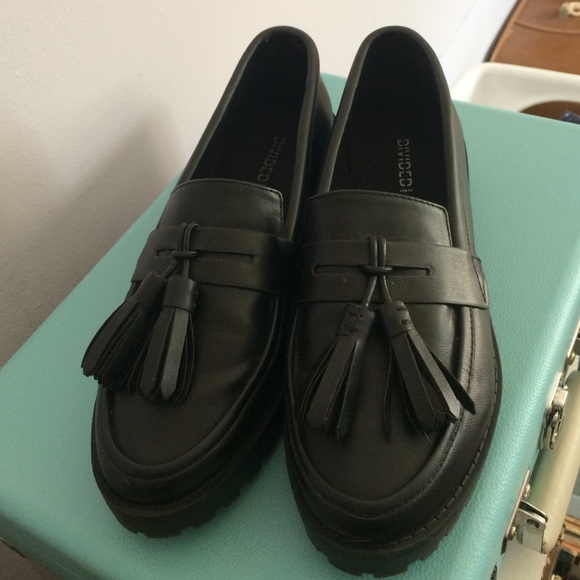 black leather loafers