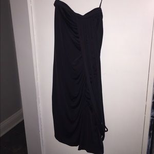 Black strapless dress with decorative strings