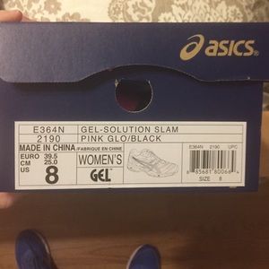 Aasics tennis shoes. Never worn!