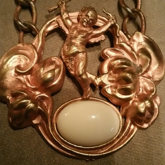Necklace with cherub pendant