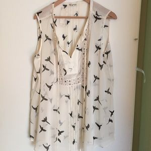 Sleeveless sheer blouse