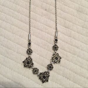 Brighton black flowered necklace.