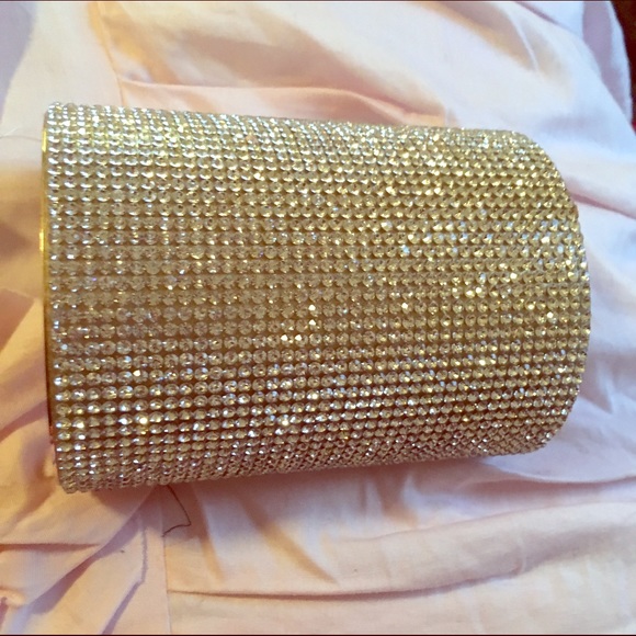 Gold and rhinestone glam wrist cuff.