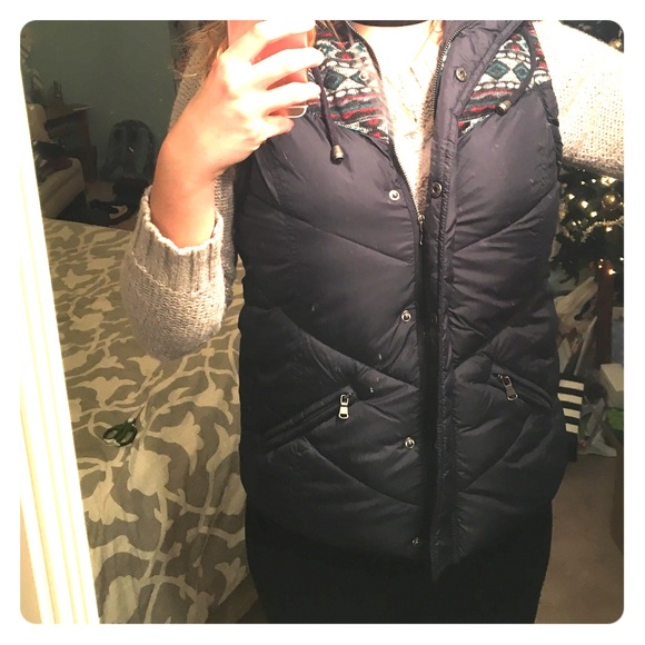 Black hooded vest