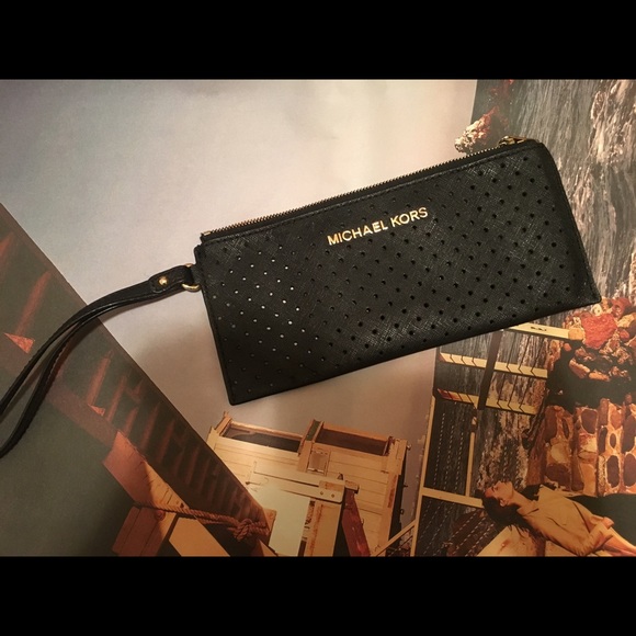 Michael Kors wristlet (perforated black leather) - Picture 1 of 3
