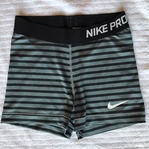 Black and gray striped Nike pro dri fit shorts