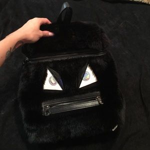 Nasty gal fuzzy monster backpack 🎒