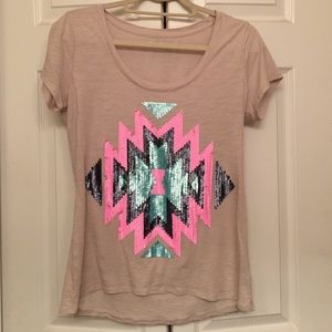 Express shirt with bright Aztec design.