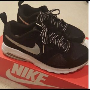 Nike sneakers and black booties