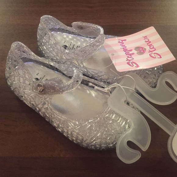 Silver glittery jelly flats, size 5.