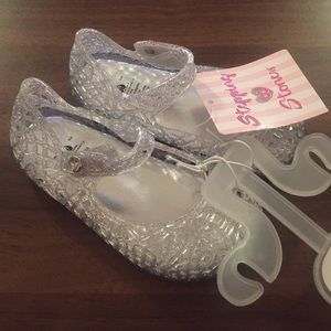 Silver glittery jelly flats, size 5.