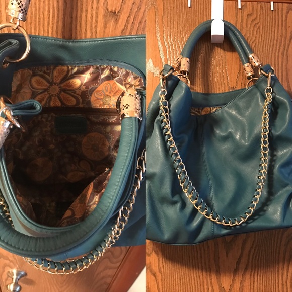 Teal leather purse.