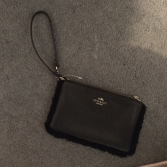 Coach black wristlet with trim