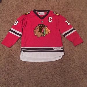 Jonathan Toews NHL hockey jersey.