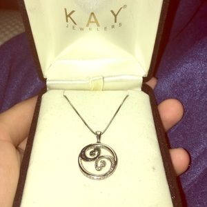 White and blue diamond open heart necklace