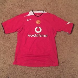Manchester United jersey.