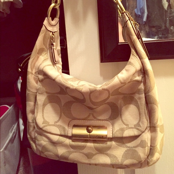 Gold and cream Coach hobo bag