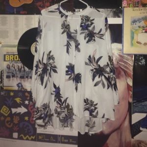 Free People floral flowy long sleeve high low top!