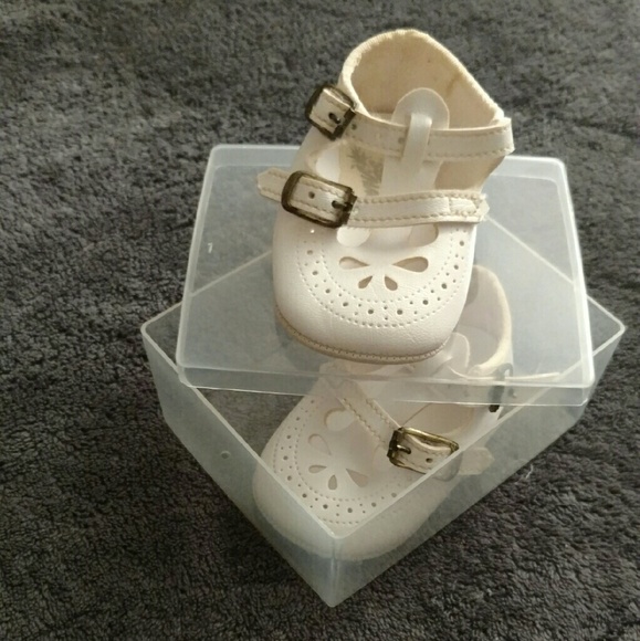 White baby shoes