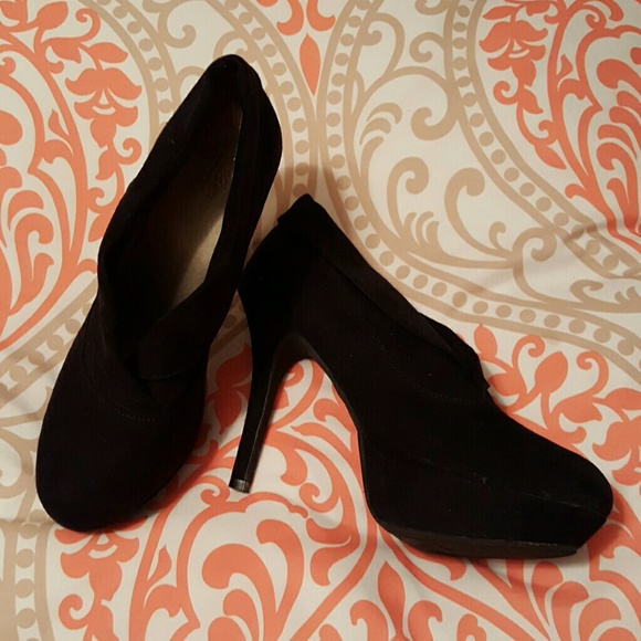 Black suede booties with a killer heel