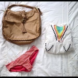 Tan purse with bright lining