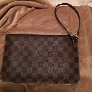 Authentic Louis Vuitton wristlet...