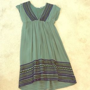 Green dress with beading detail