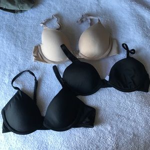 Three women's bras. One pink, two target