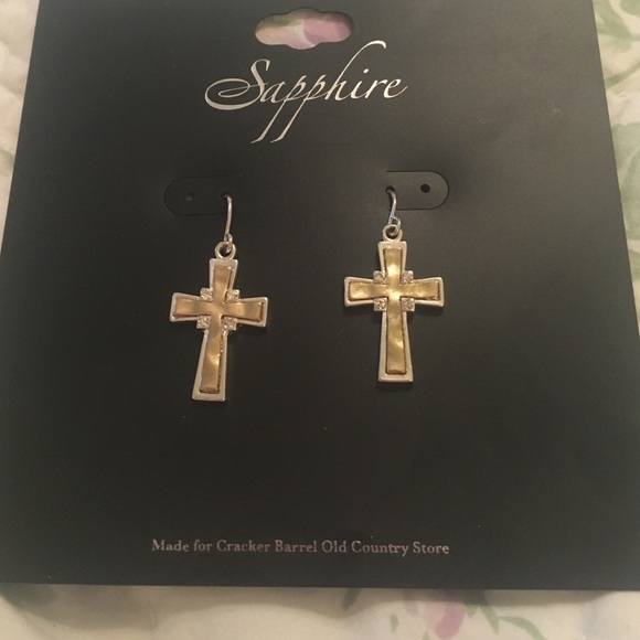 Brand new silver and gold cross earrings.