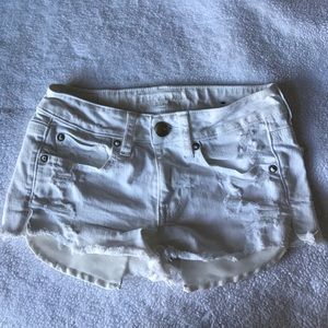 White distressed denim shorts