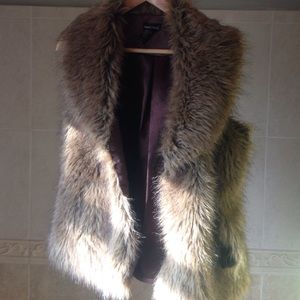 L FAUX FUR VEST- wet seat $15