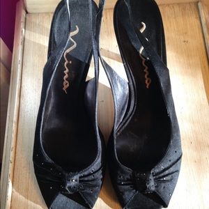 Peek a boo toe black heels