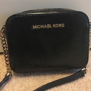 Authentic Michael Kors black and gold cross body