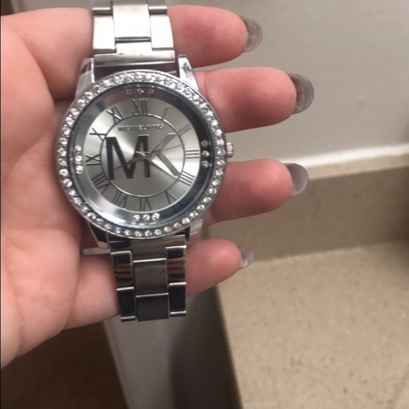 Silver watch with MK logo