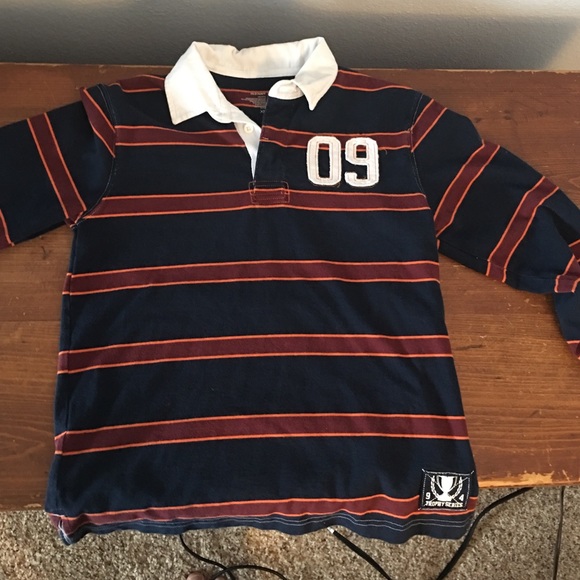 Boys rugby style collared shirt long sleeve.