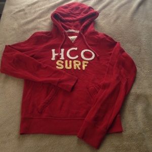 Red Hollister sweatshirt.