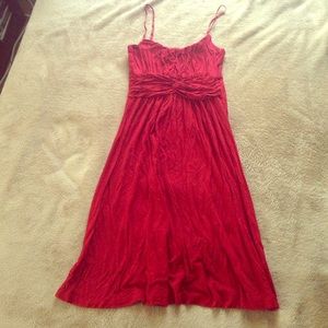 Flattering red dress.