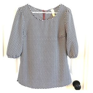Boutique chevron blouse with zipper back