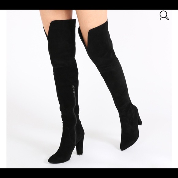 Thigh high black boots