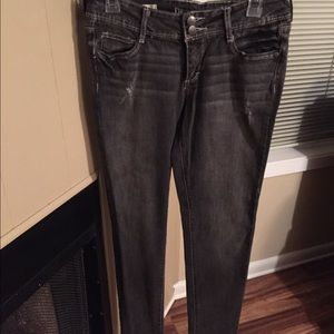 Dark grey distressed skinny jeans