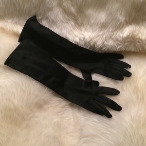 Shiny material small gloves fitted mid arm