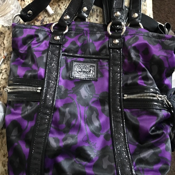 Purple ocelot coach purse