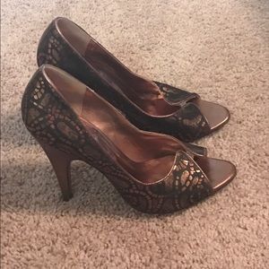 Carlos by Carlos Santana black and bronze pumps