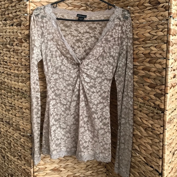 Low cut, beige lace top.