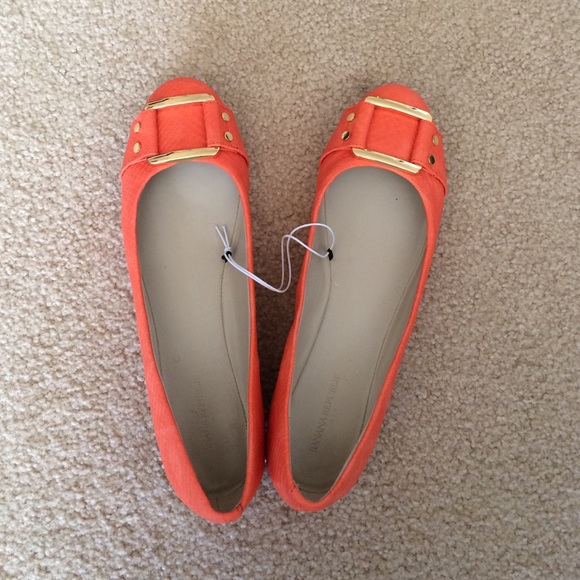 Banana Republic orange snakeskin flats.