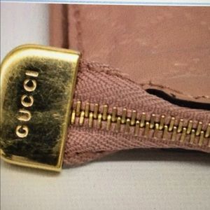 Gucci Coin and key wallet.